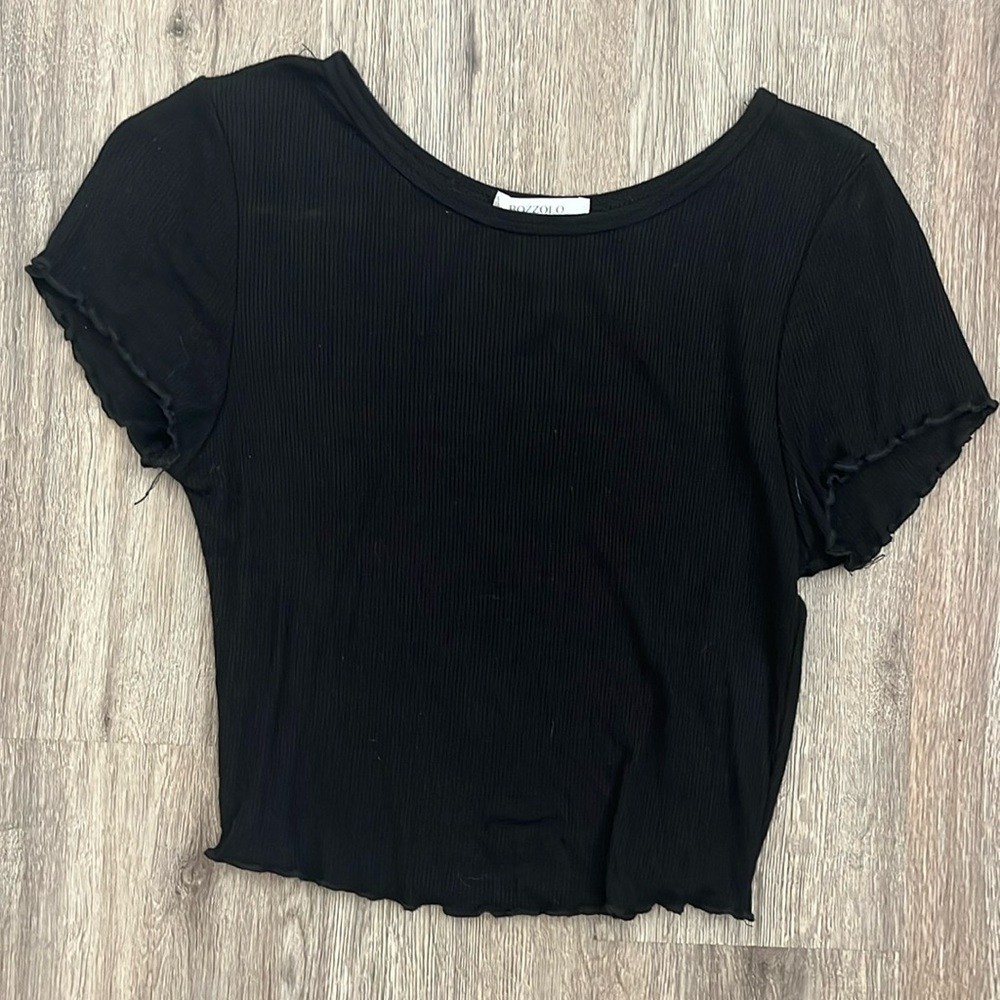 black ruffled top